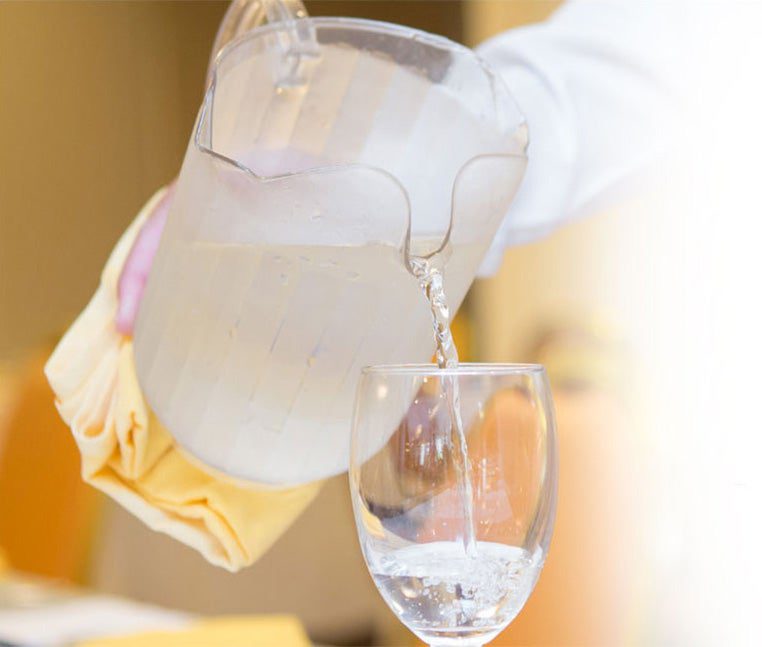 Fresh Clean water being poured from a picture into a glass.